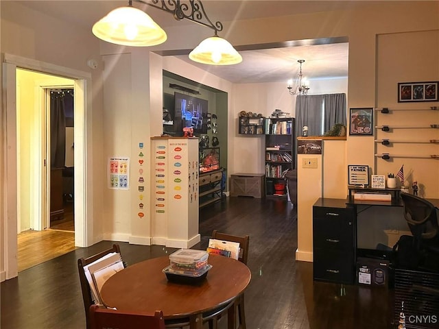 237 James St, Lenox, NY 13032 - dining area with a chandelier, wood finished floors, and baseboards