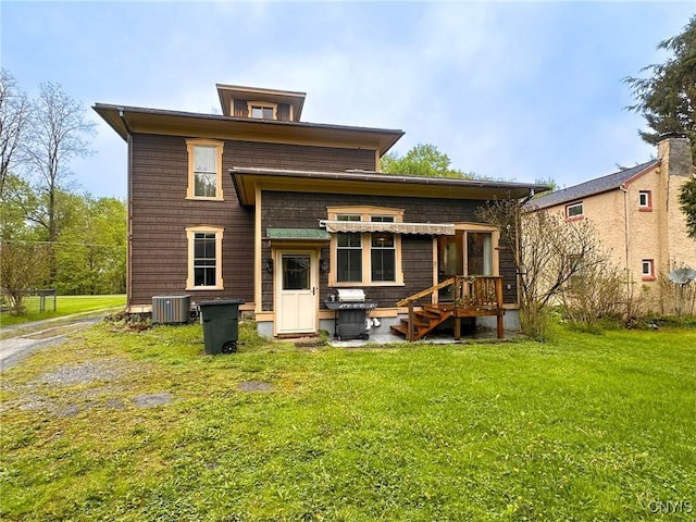 237 James St, Lenox, NY 13032 - rear view of property with central AC unit and a lawn