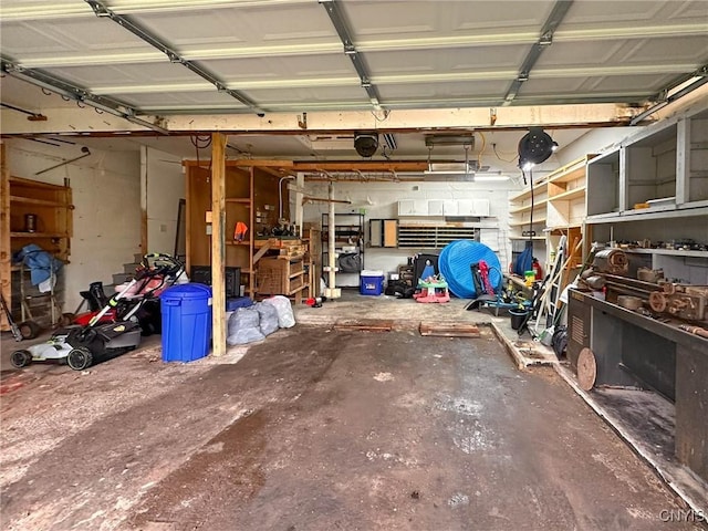 237 James St, Lenox, NY 13032 - garage featuring a workshop area