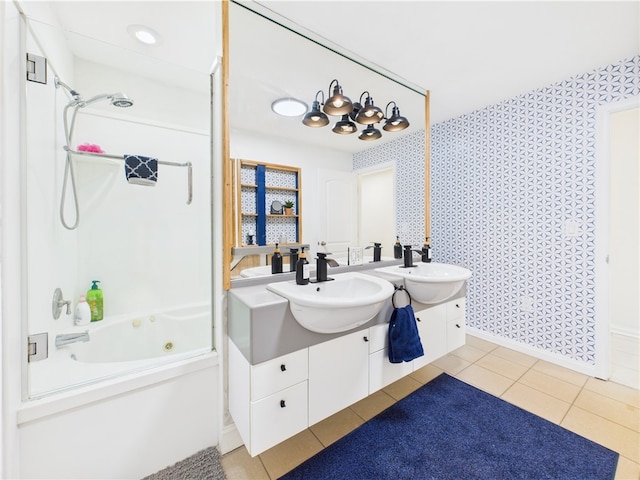 bathroom featuring wallpapered walls,  shower combination, vanity, tile patterned floors, and baseboards