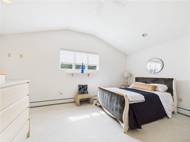 bedroom featuring baseboard heating, carpet, and lofted ceiling