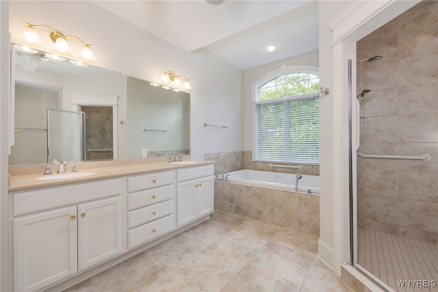 56 Sunset Ln, Orchard Park, NY 14127 - bathroom featuring a shower stall, a bath, double vanity, and tile patterned floors