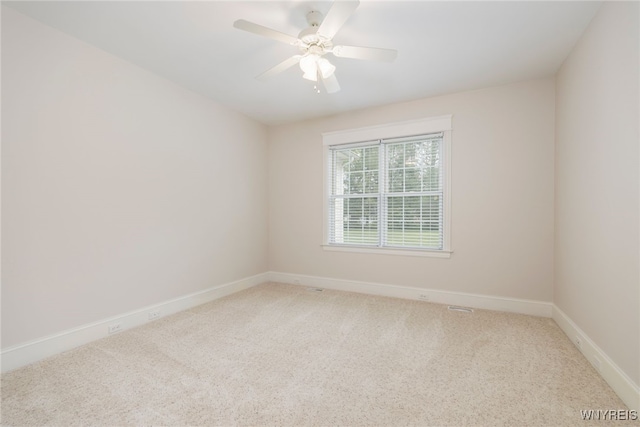 56 Sunset Ln, Orchard Park, NY 14127 - carpeted spare room with baseboards and ceiling fan
