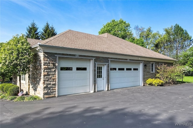 56 Sunset Ln, Orchard Park, NY 14127 - garage featuring driveway