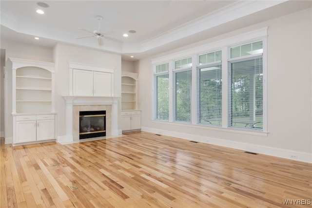 56 Sunset Ln, Orchard Park, NY 14127 - unfurnished living room with light wood-style floors, ceiling fan, ornamental molding, a fireplace, and baseboards