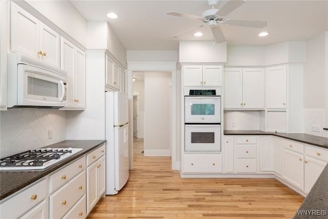 56 Sunset Ln, Orchard Park, NY 14127 - kitchen featuring white appliances, light wood finished floors, ceiling fan, white cabinetry, and recessed lighting