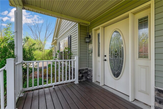 1275 Center St, Aurora, NY 14052 - property entrance with covered porch and stone siding