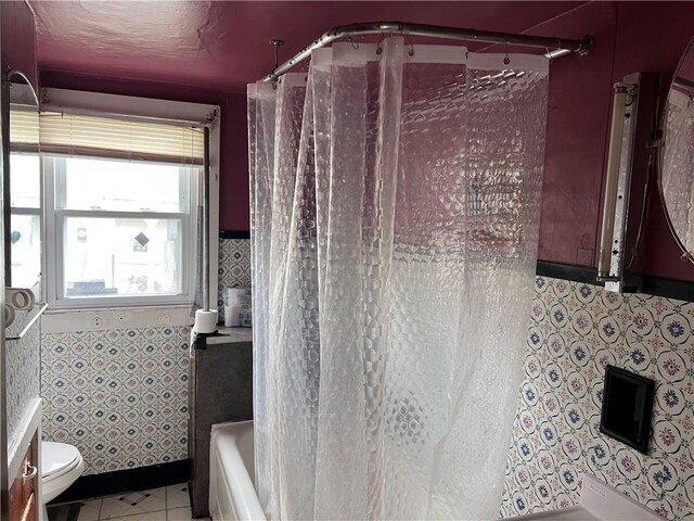 332 Jamestown St, Persia, NY 14070 - full bathroom featuring toilet and tile patterned floors