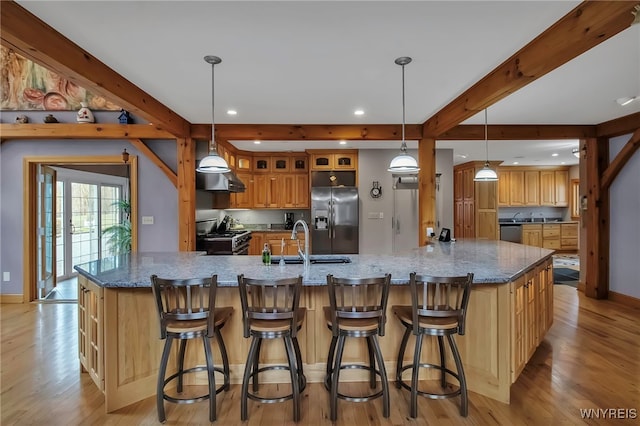 100 May Dr, Elma, NY 14059 - kitchen featuring appliances with stainless steel finishes, beam ceiling, recessed lighting, light wood-style floors, and a sink