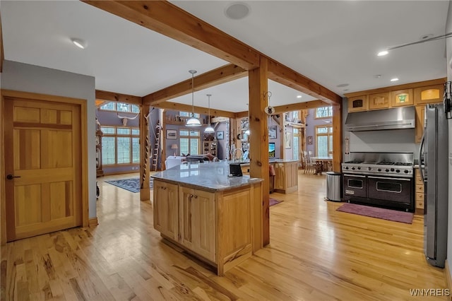 100 May Dr, Elma, NY 14059 - kitchen with double oven range, freestanding refrigerator, under cabinet range hood, light wood-style floors, and recessed lighting