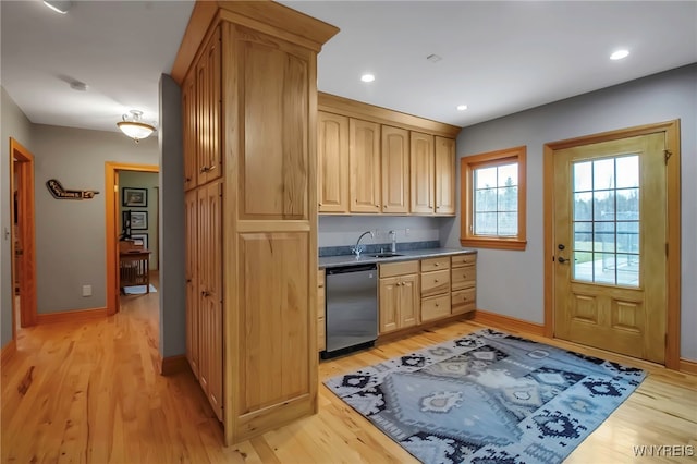 100 May Dr, Elma, NY 14059 - kitchen with dishwasher, light wood-type flooring, baseboards, light brown cabinetry, and a sink