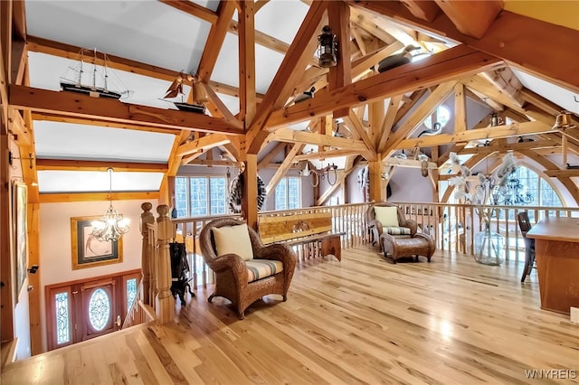 100 May Dr, Elma, NY 14059 - sitting room featuring a chandelier, an upstairs landing, and wood finished floors