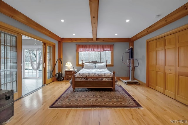 100 May Dr, Elma, NY 14059 - bedroom with light wood-type flooring, access to exterior, recessed lighting, baseboards, and beam ceiling