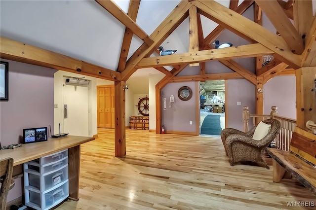 100 May Dr, Elma, NY 14059 - sitting room with light wood-style flooring, high vaulted ceiling, and beam ceiling
