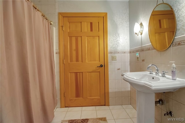 100 May Dr, Elma, NY 14059 - full bath with a shower with shower curtain, tile patterned flooring, and tile walls