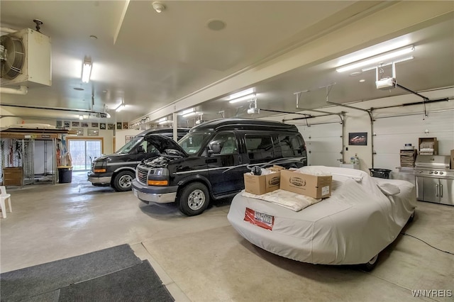 100 May Dr, Elma, NY 14059 - garage featuring a garage door opener