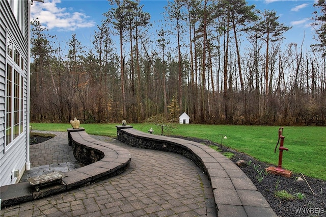 100 May Dr, Elma, NY 14059 - view of patio with a forest view