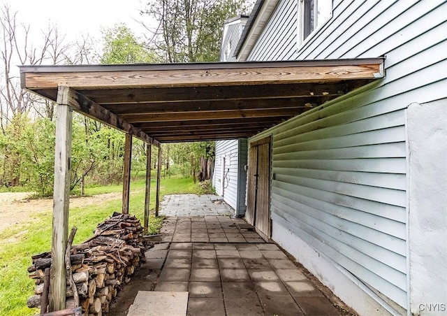 view of patio with an attached carport