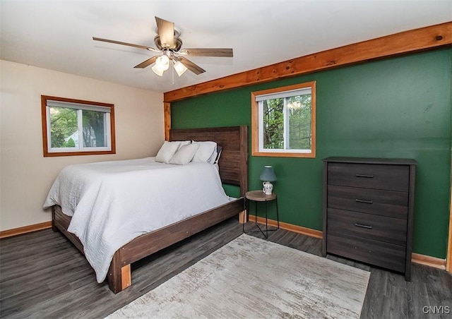 bedroom with baseboards, wood finished floors, and ceiling fan