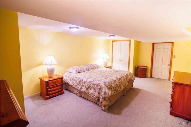 4692 Murphy Rd, Tully, NY 13159 - bedroom with light carpet, a closet, and baseboards
