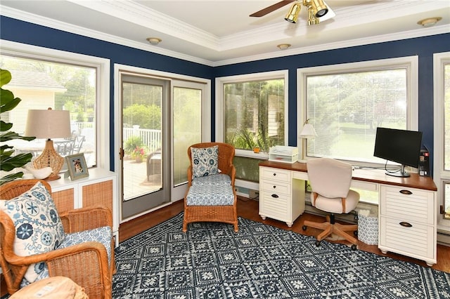 office area featuring healthy amount of natural light, ceiling fan, ornamental molding, and dark wood-style flooring