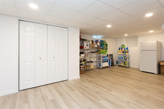 recreation room featuring light wood-type flooring, recessed lighting, and baseboards