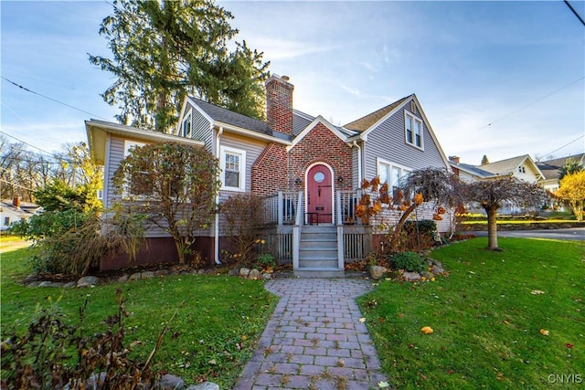 view of front of property featuring a front lawn and a chimney