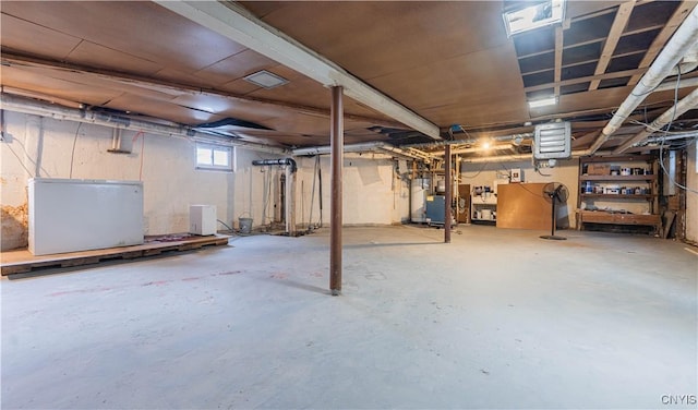 basement with refrigerator