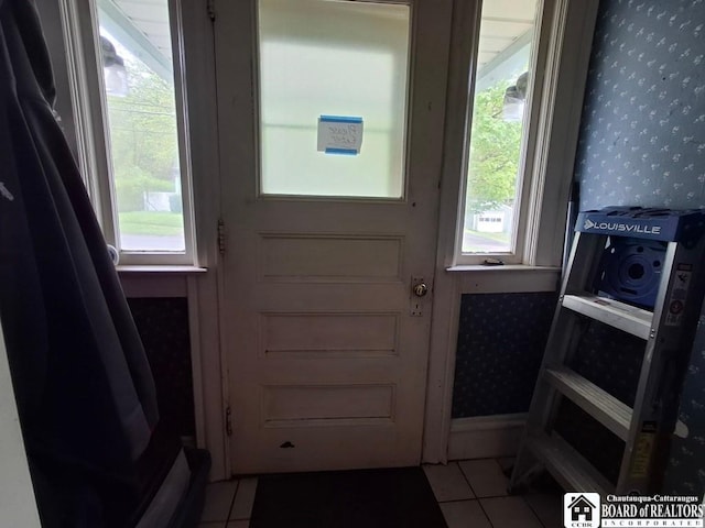 11 Prather Ave, Jamestown, NY 14701 - doorway to outside with wallpapered walls and tile patterned flooring