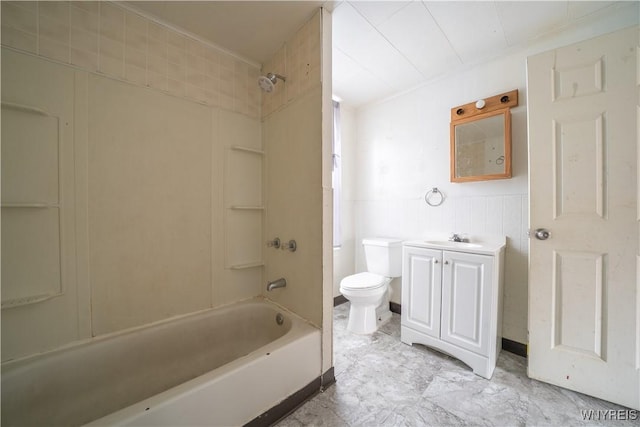 bathroom with toilet, vanity, and shower / bath combination