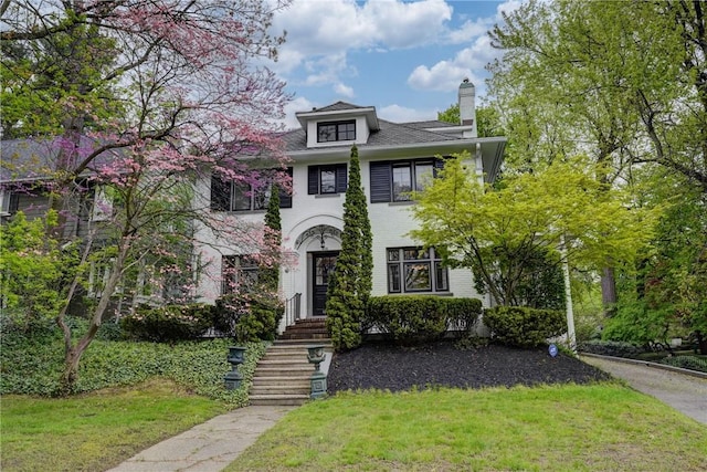 1598 Highland Ave, Rochester, NY 14618 - american foursquare style home with a chimney and a front yard