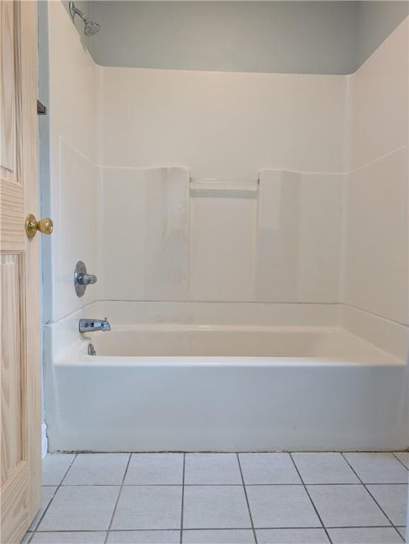bathroom featuring tile patterned floors and shower / bathtub combination