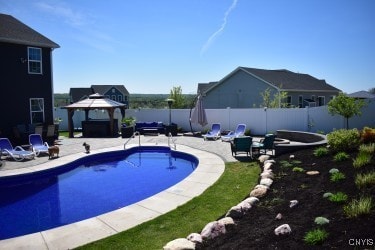 5546 Rolling Meadows Way, Camillus, NY 13031 - view of swimming pool featuring a gazebo and a patio area