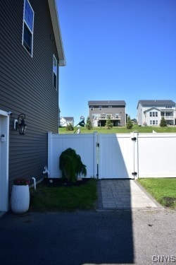 5546 Rolling Meadows Way, Camillus, NY 13031 - view of side of home featuring a gate
