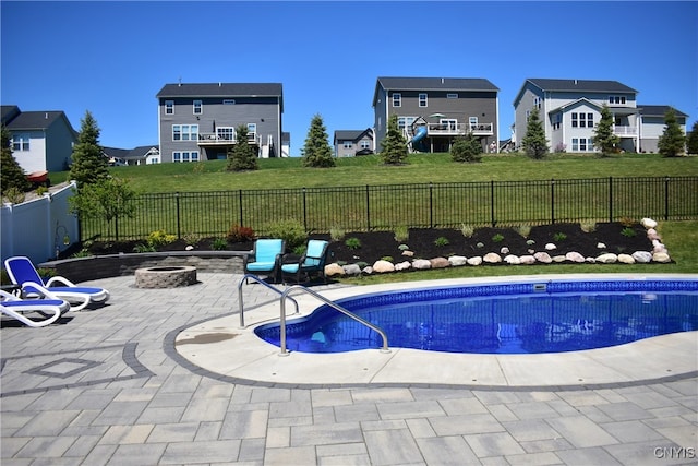 5546 Rolling Meadows Way, Camillus, NY 13031 - view of pool featuring a fire pit, a patio, a fenced backyard, and a residential view