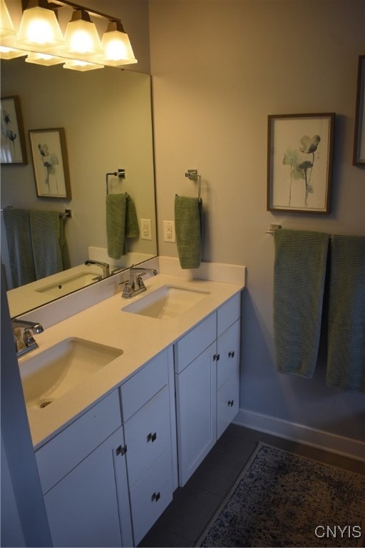 5546 Rolling Meadows Way, Camillus, NY 13031 - bathroom featuring double vanity and tile patterned flooring