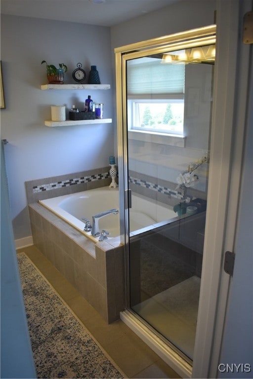 5546 Rolling Meadows Way, Camillus, NY 13031 - bathroom featuring a garden tub and a stall shower