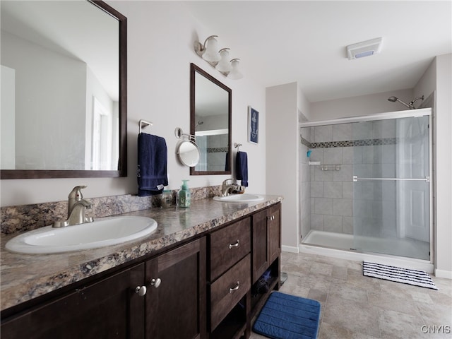36395 Sarah Ln, Orleans, NY 13656 - full bath with a stall shower, double vanity, and baseboards