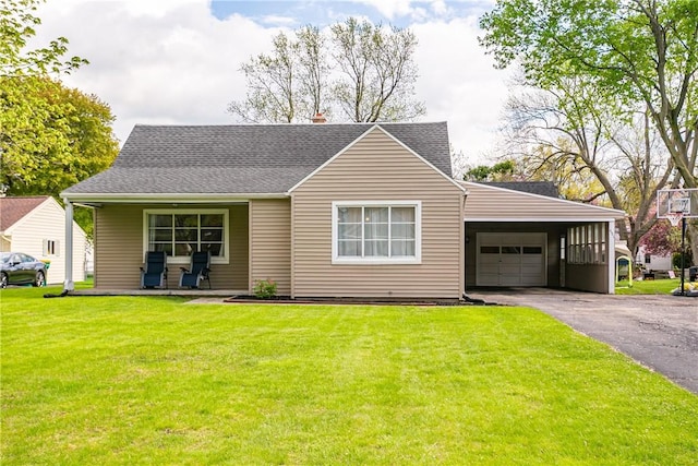 view of front facade featuring a garage, a front lawn, asphalt driveway, covered porch, and roof with shingles