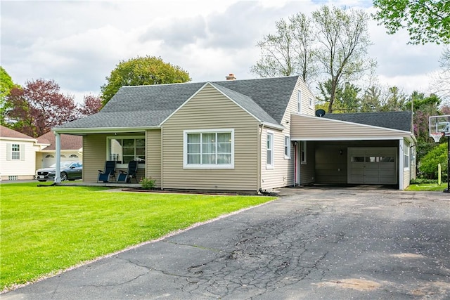 view of front of home featuring a front yard, a shingled roof, and a chimney