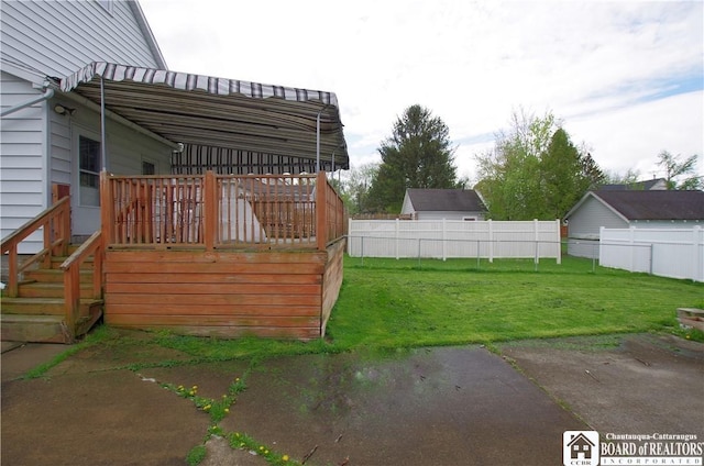 view of yard with a deck