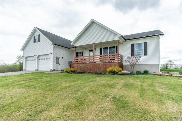 29556 County Route 46, Le Ray, NY 13637 - view of front of house with a front yard, a garage, a porch, and driveway