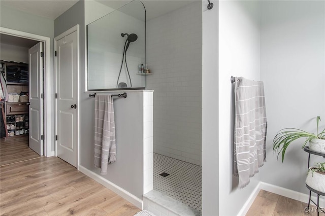 29556 County Route 46, Le Ray, NY 13637 - full bath featuring walk in shower, wood finished floors, and baseboards