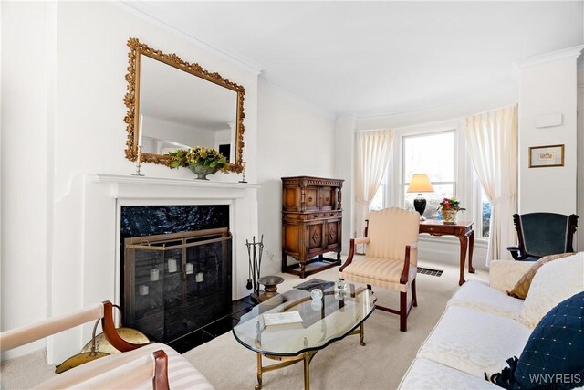 47 Beard Ave, Buffalo, NY 14214 - carpeted living room featuring ornamental molding and a high end fireplace