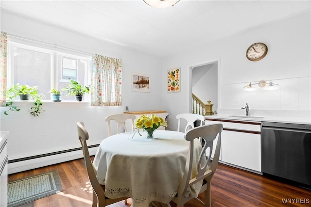 47 Beard Ave, Buffalo, NY 14214 - dining space with a baseboard radiator and dark wood-style flooring