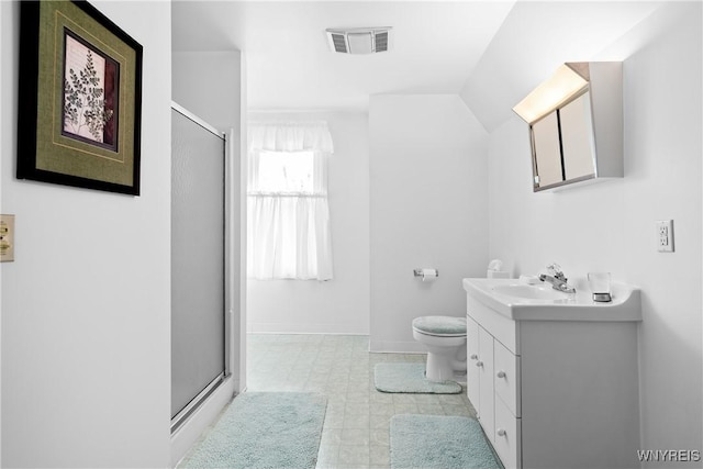 47 Beard Ave, Buffalo, NY 14214 - full bath featuring a shower stall, vanity, toilet, vaulted ceiling, and baseboards