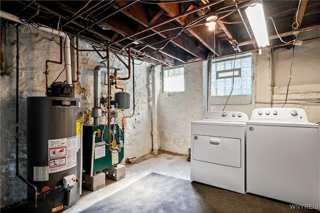 47 Beard Ave, Buffalo, NY 14214 - below grade area featuring water heater, washer and dryer, and a heating unit