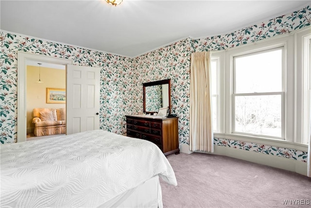 47 Beard Ave, Buffalo, NY 14214 - bedroom with wallpapered walls, light colored carpet, and crown molding