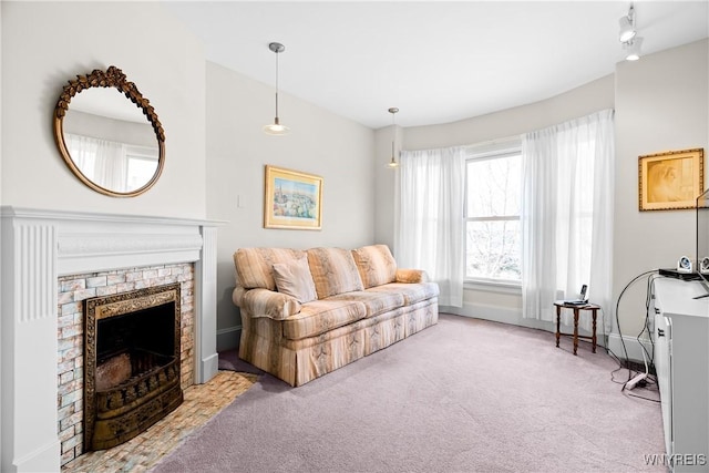 47 Beard Ave, Buffalo, NY 14214 - carpeted living room featuring a fireplace with flush hearth and baseboards