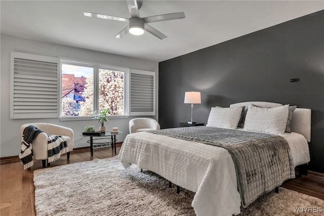20 Harbour Pointe, Buffalo, NY 14202 - bedroom featuring baseboards, wood finished floors, and a ceiling fan
